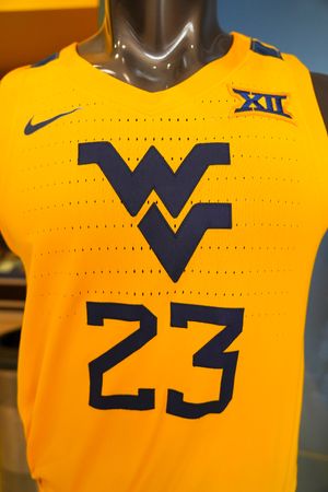 Gold mens basketball jersey with Flying WV and number 23