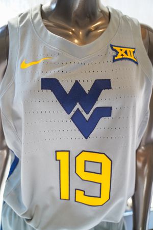 Grey womens basketball jersey with Flying WV and number 19