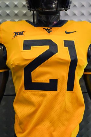 Gold WVU football jersey with number 21